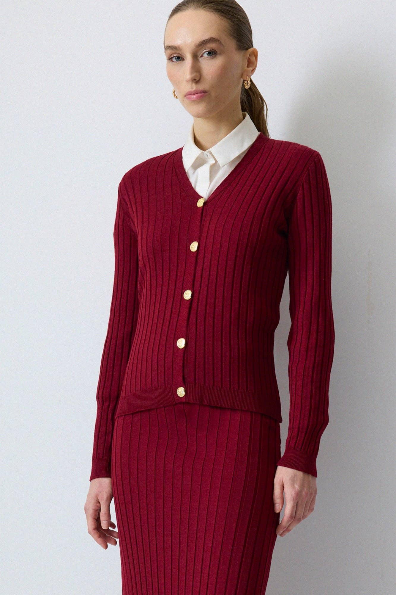 Set coordinato in maglia con cardigan e gonna lunga
