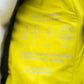Piumino giallo in poliestere riciclato con cappuccio