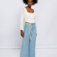 Blusa corta in rayon con maniche a sbuffo