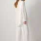 Maglia stratificata in pizzo con scollo a V
