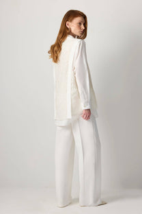 Maglia stratificata in pizzo con scollo a V