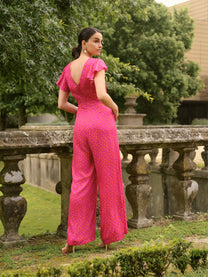 Tuta jumpsuit Pintas a pois fucsia
