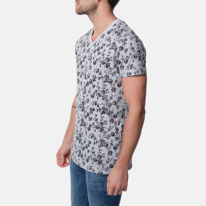 T-shirt uomo grigia con stampa floreale e scollo a V
