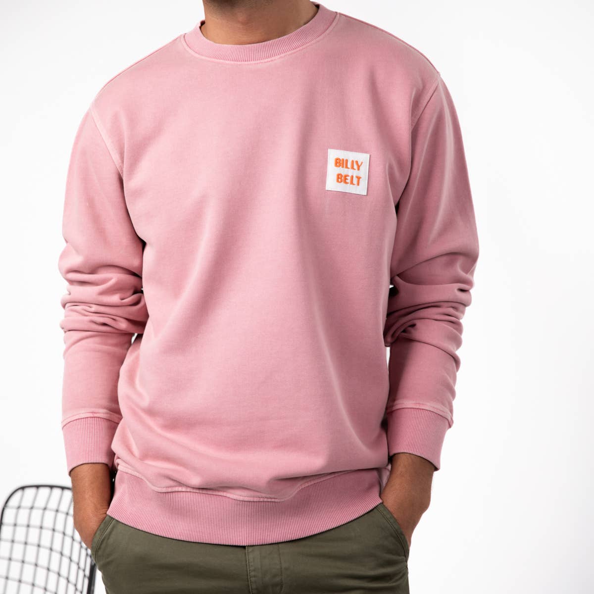 Felpa unisex rosa in cotone biologico con patch logo
