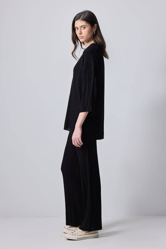 Completo in maglia nero con tunica e pantaloni
