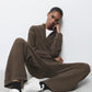Pantaloni in maglia larghi con dettagli crochet