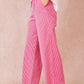Pantaloni a righe rosa e bianche in cotone a gamba larga