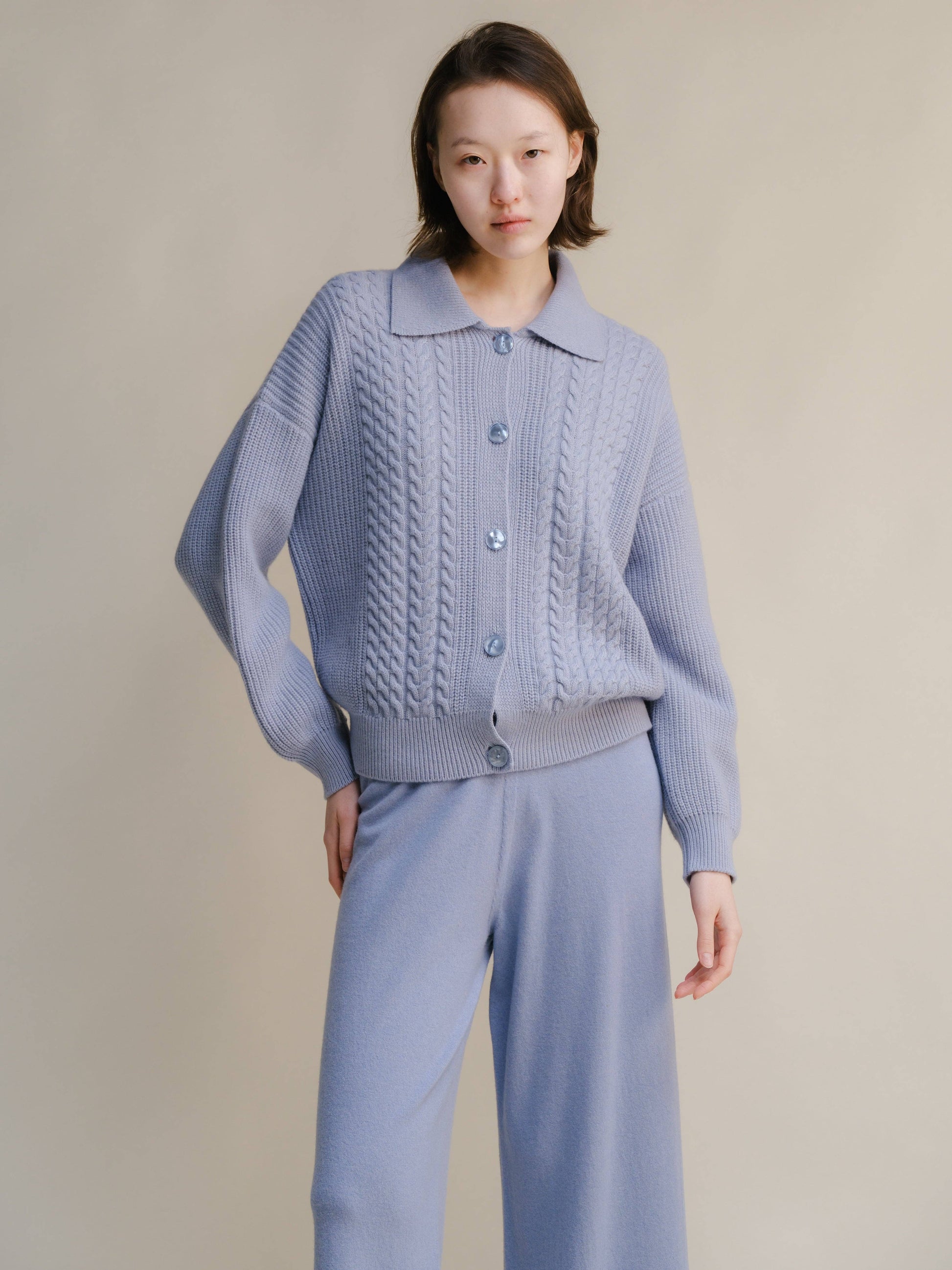 Cardigan polo in misto cashmere con trecce