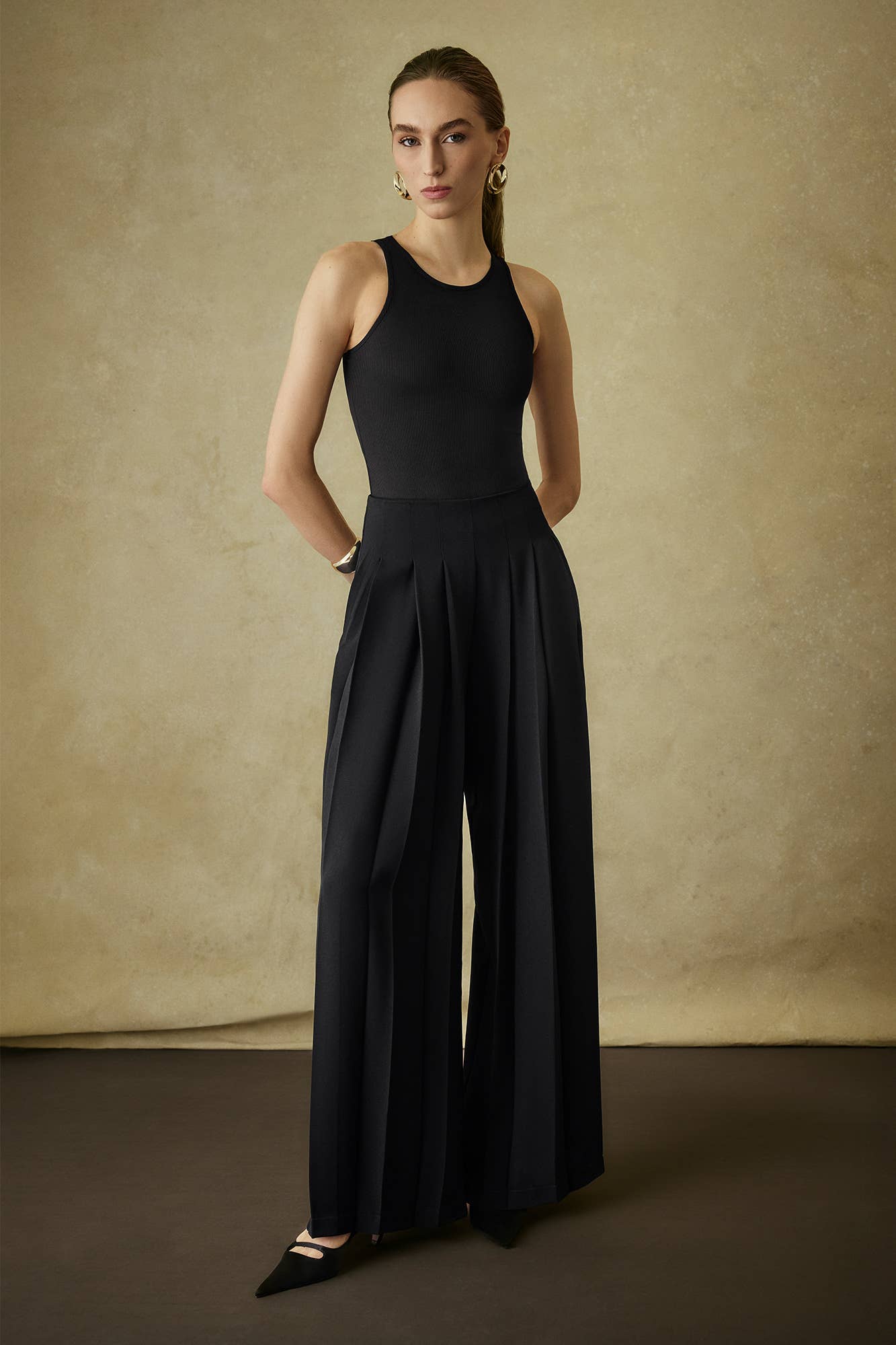 Pantaloni palazzo in crêpe a vita alta con pieghe