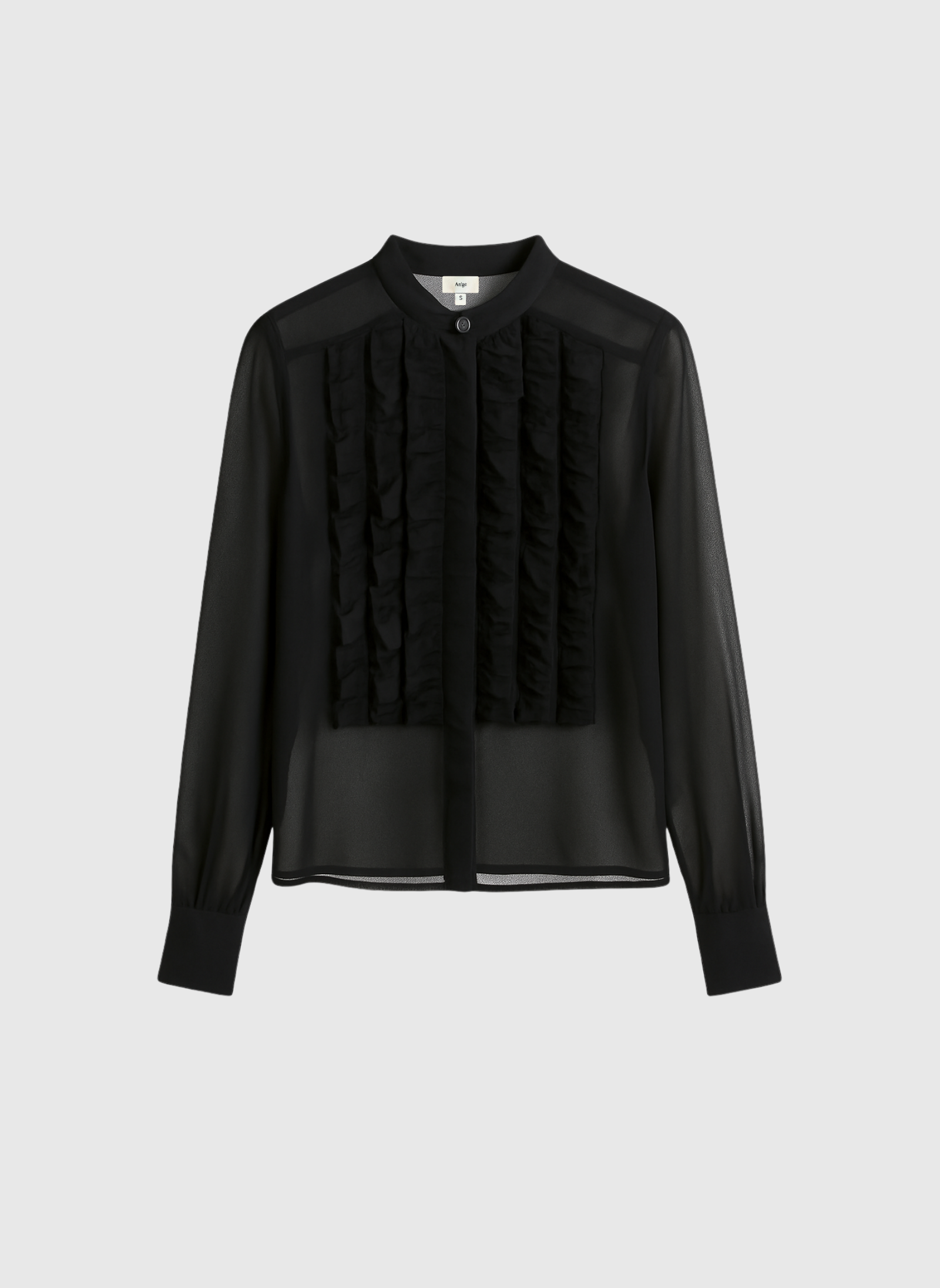 Blusa nera trasparente con volant