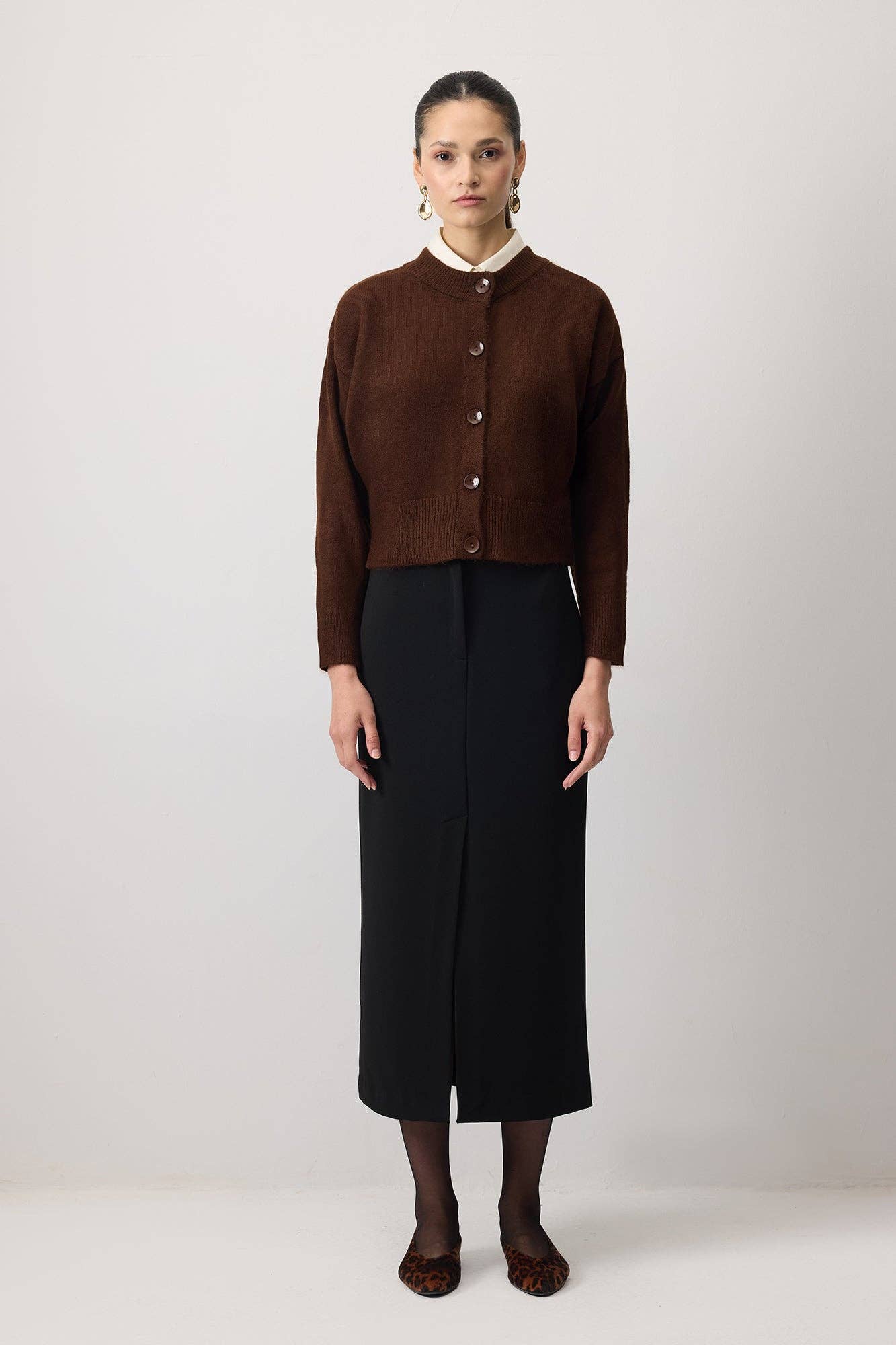 Cardigan corto in maglia con bottoni