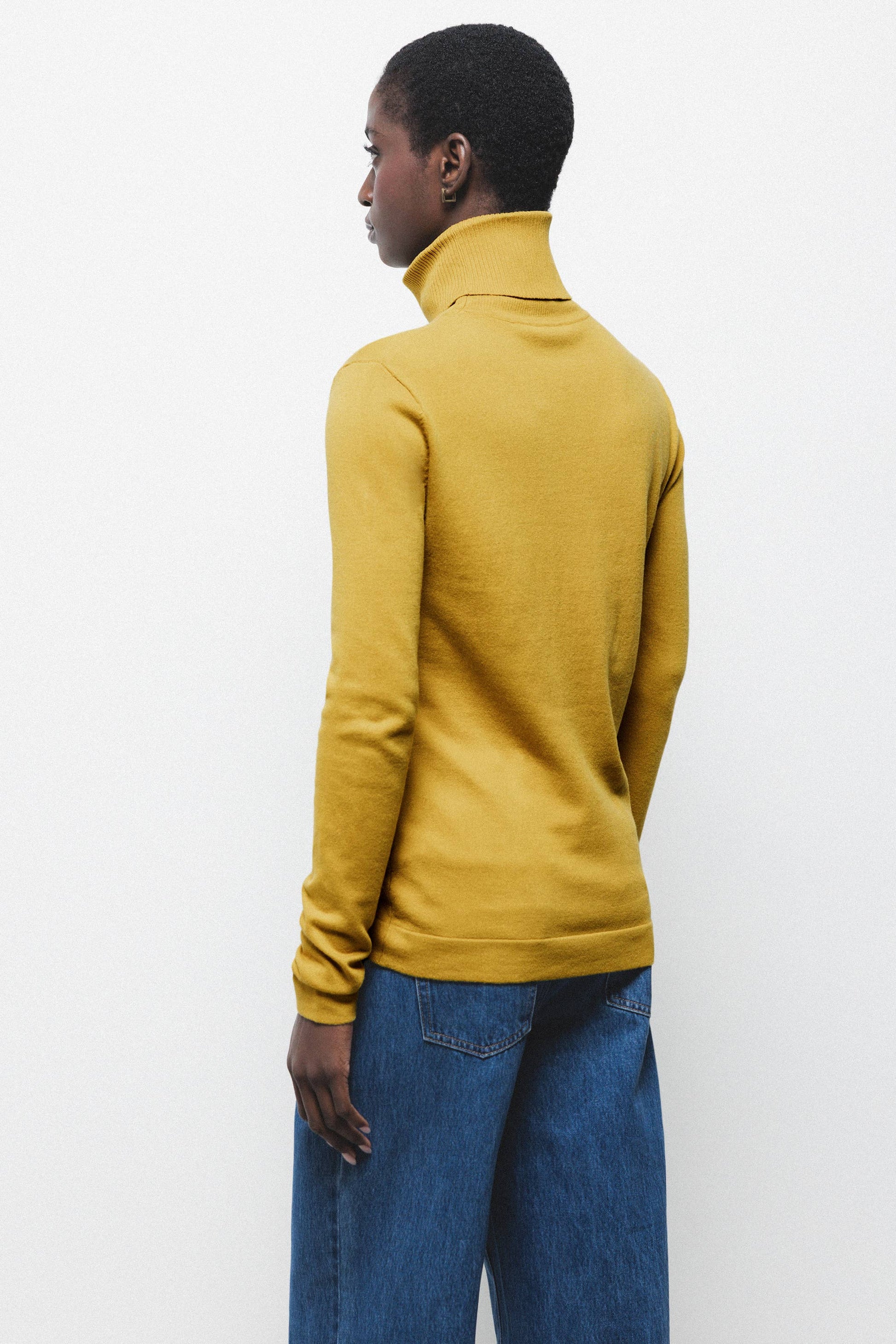 Maglione a collo alto in maglia rasata