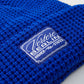 Berretto corto a nido d’ape con patch logo