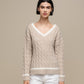 Maglione donna a trecce con scollo a V