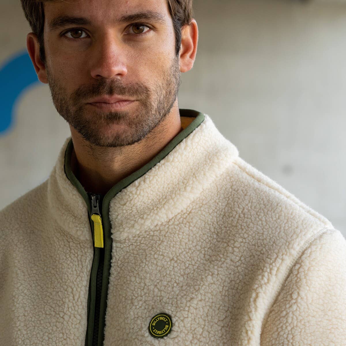 Felpa sherpa avorio con collo a zip