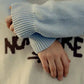Maglione beige Nowhere in cotone biologico