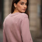Maglia rosa con scollo a V