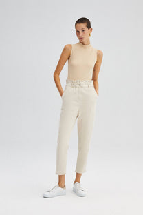 Pantaloni in denim carrot fit crema