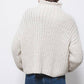 Maglione a trecce con collo alto