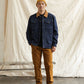 Giacca trucker in denim scuro con colletto a contrasto