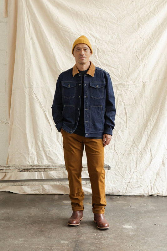 Giacca trucker in denim scuro con colletto a contrasto