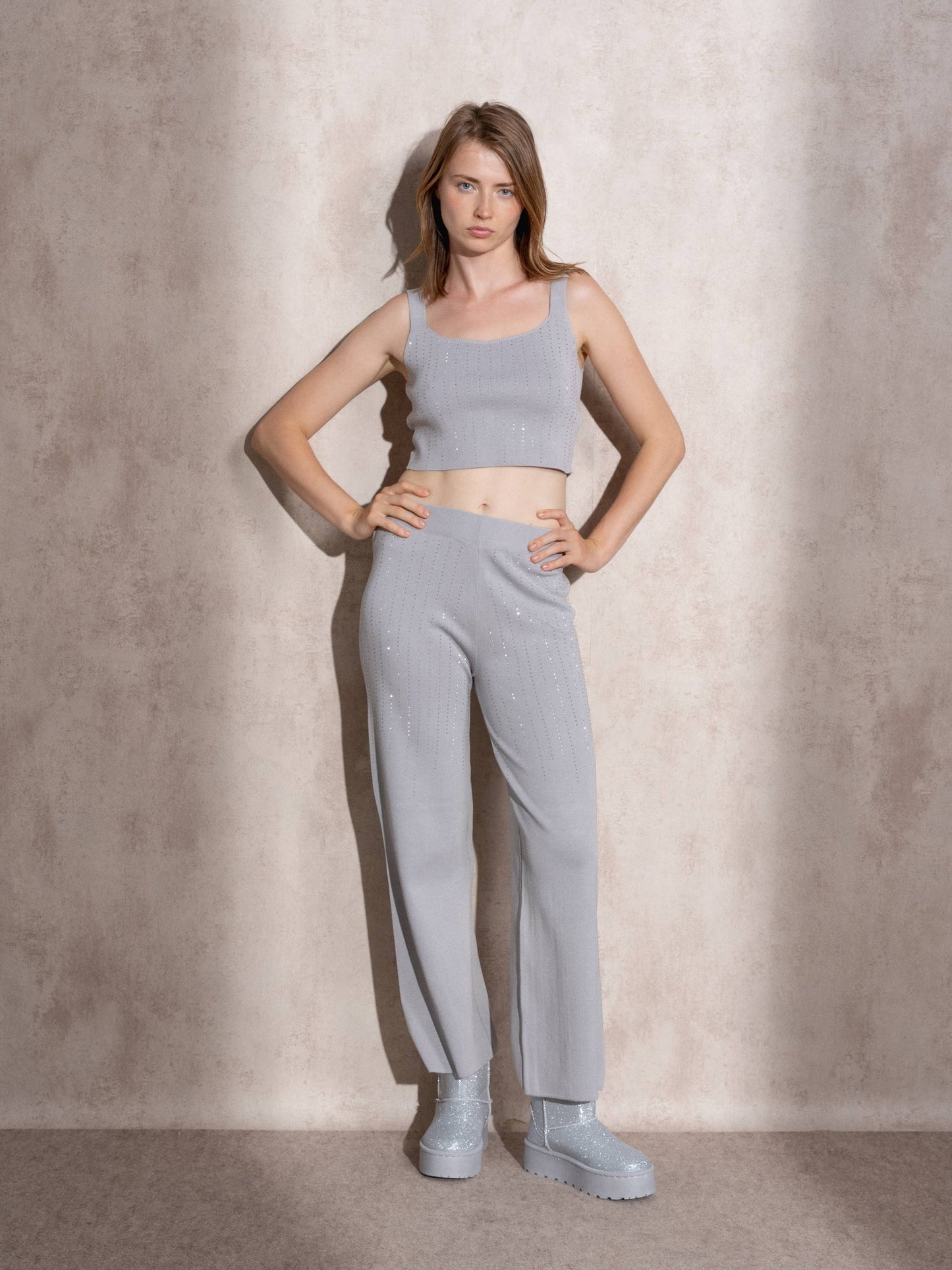Pantaloni a vita alta in maglia con glitter