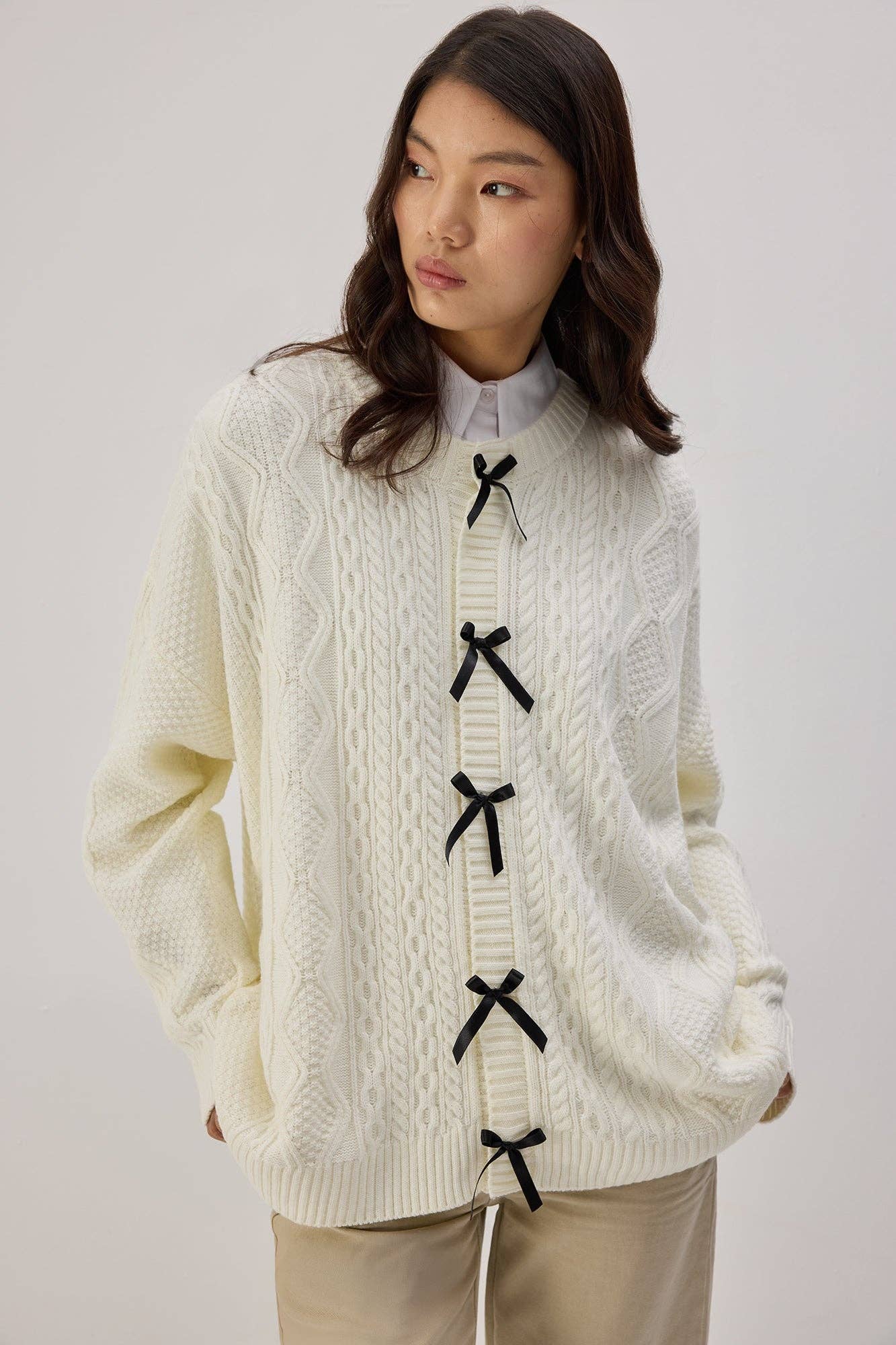 Cardigan in maglia con dettagli a fiocco
