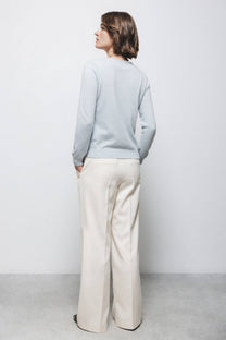 Pantaloni dritti minimal con tasche oblique