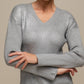 Maglione donna laminato a costine con scollo a V