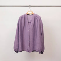 Blusa testurizzata con bottoni e scollo a V