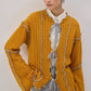 Cardigan in maglia senape con cintura a contrasto