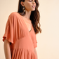 Abito fluido midi con scollo a V