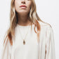 Blusa con pieghe e maniche a palloncino
