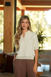 Polo traforata in cotone