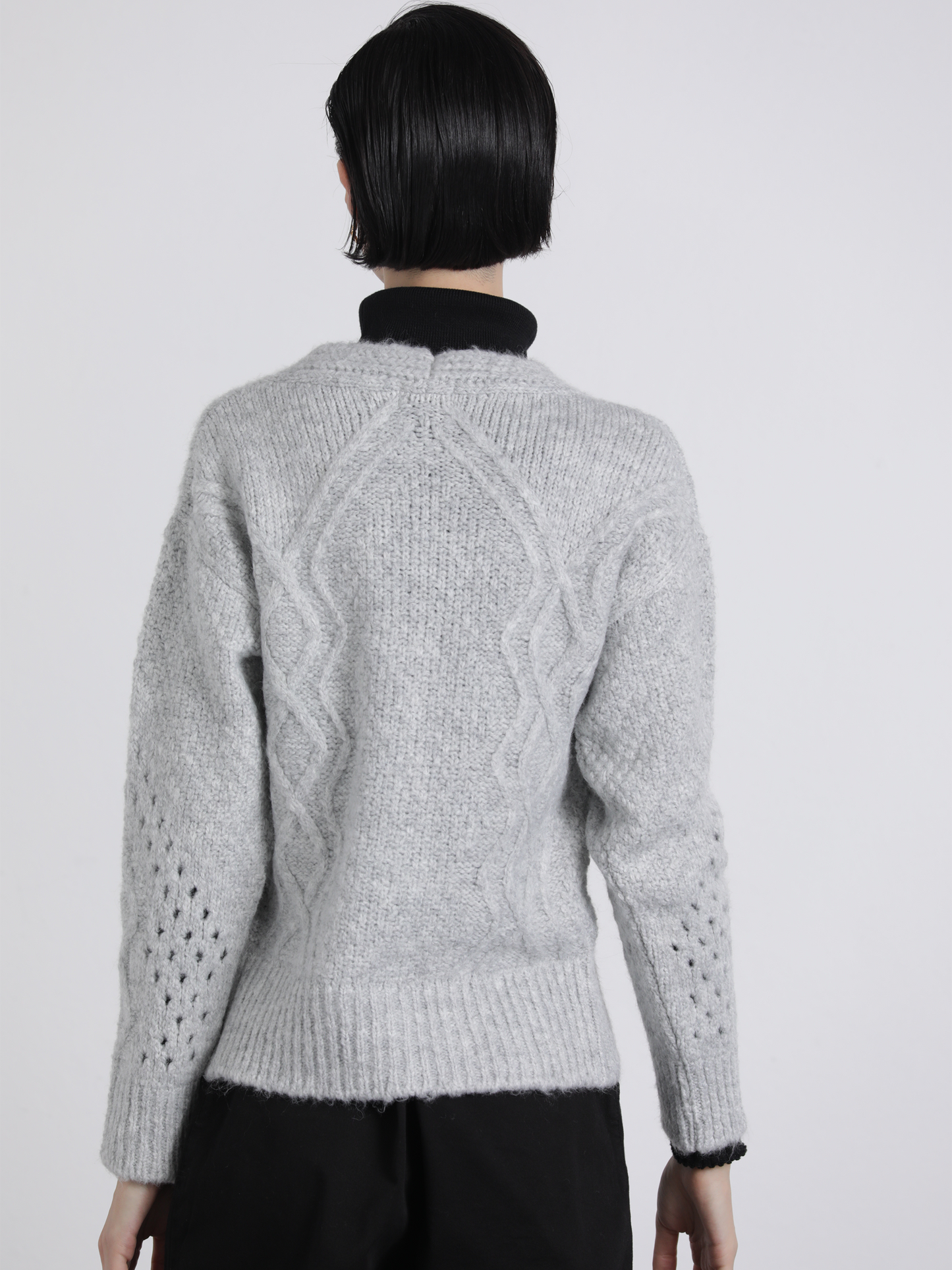 Cardigan in maglia traforata con bottoni