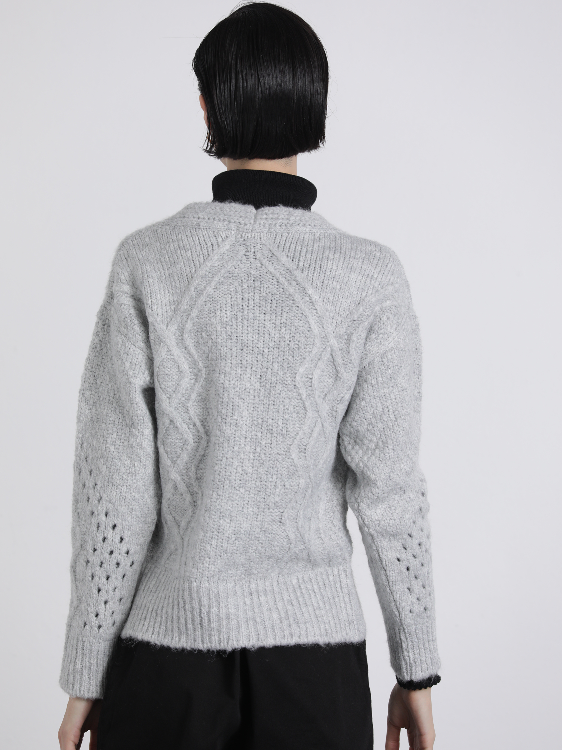 Cardigan in maglia traforata con bottoni