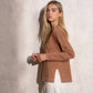 Maglione in maglia lurex con scollo a V