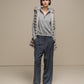 Gilet con cappuccio in ecopelliccia a righe