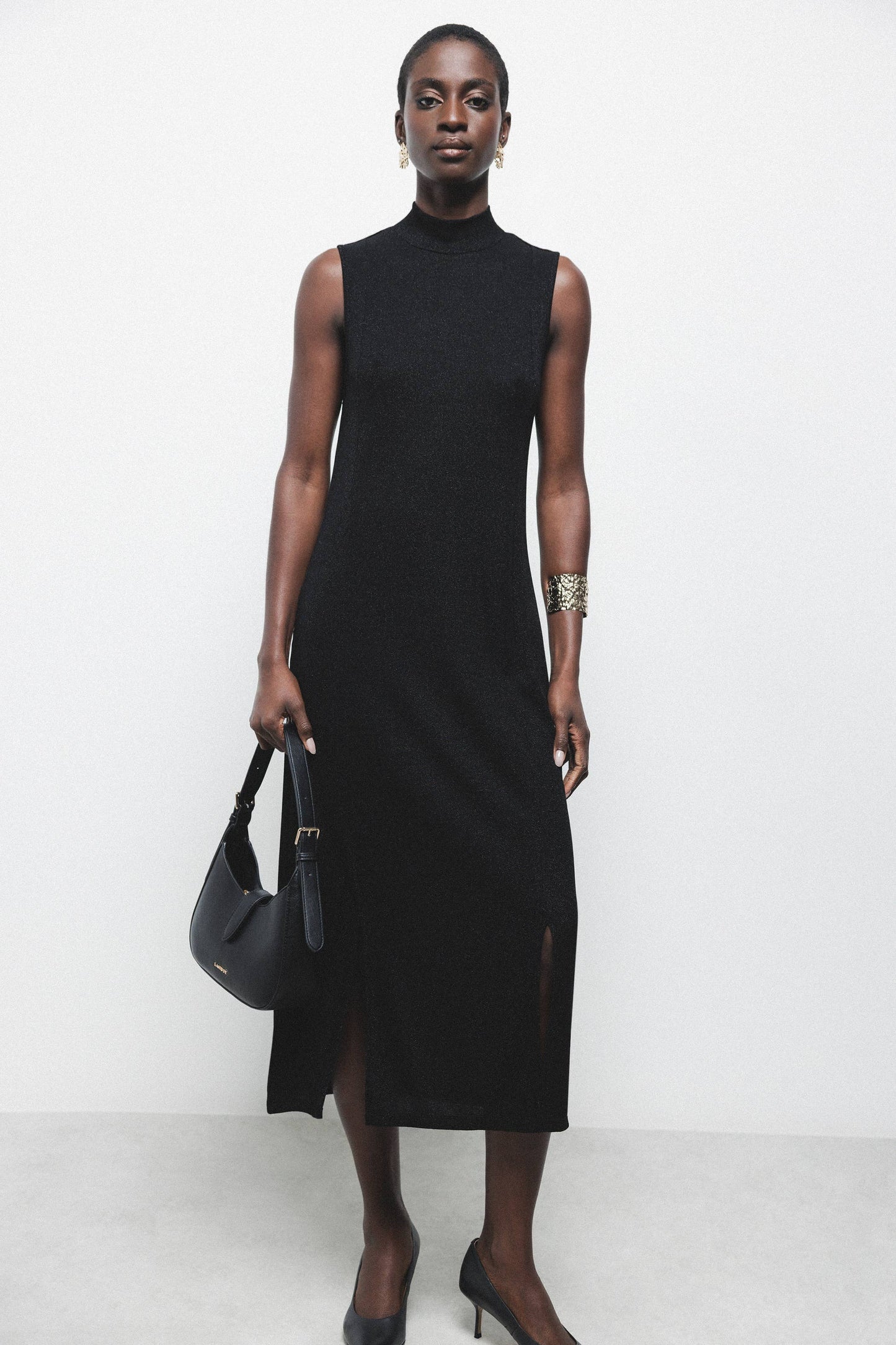Abito midi nero con dettagli metallici