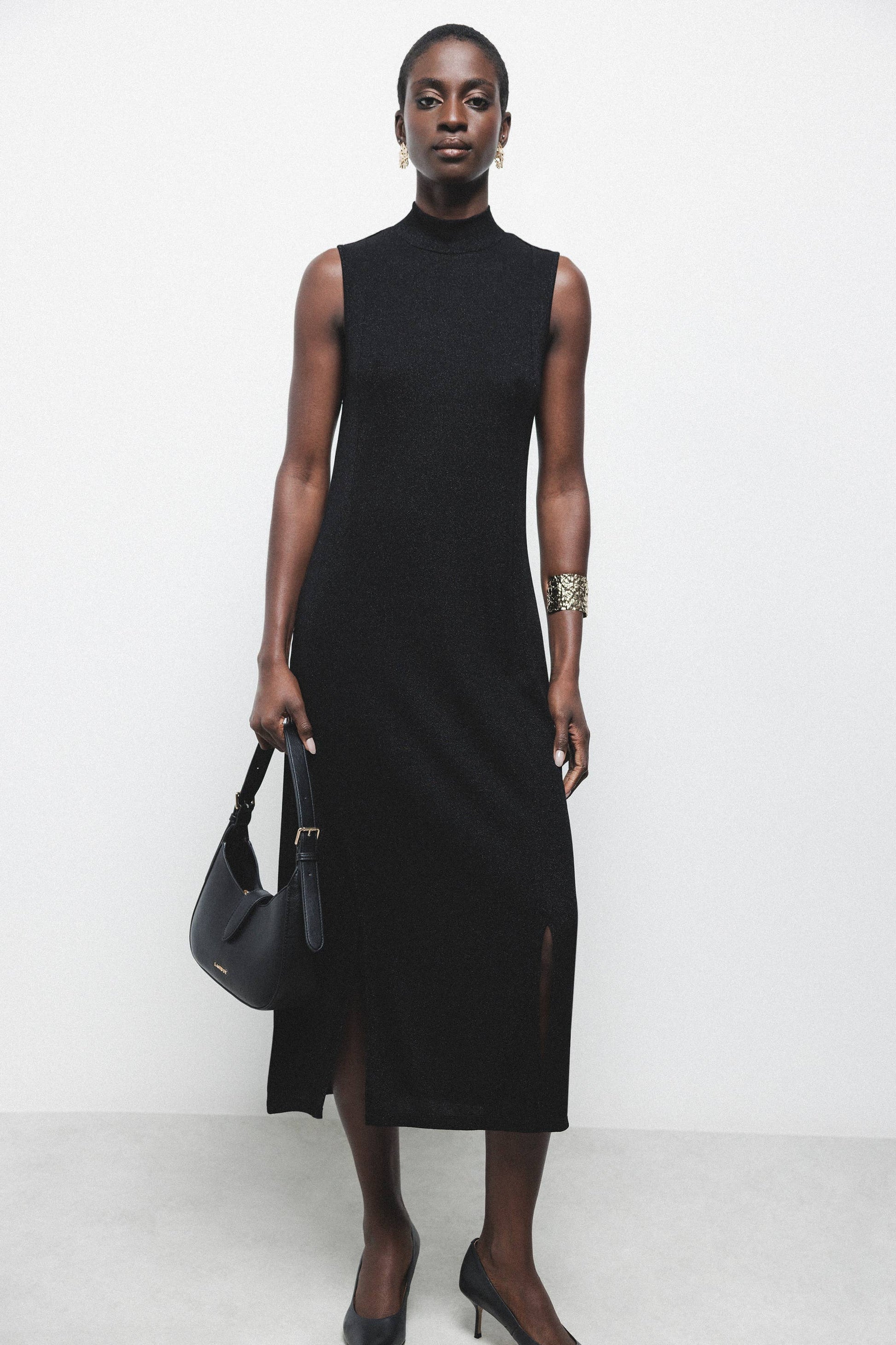 Abito midi nero con dettagli metallici