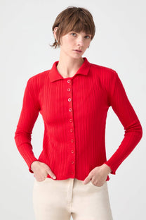 Top in maglia a coste con colletto polo e bottoni