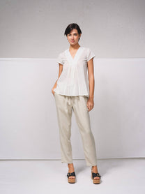 Blusa in cotone con scollo a V e volant