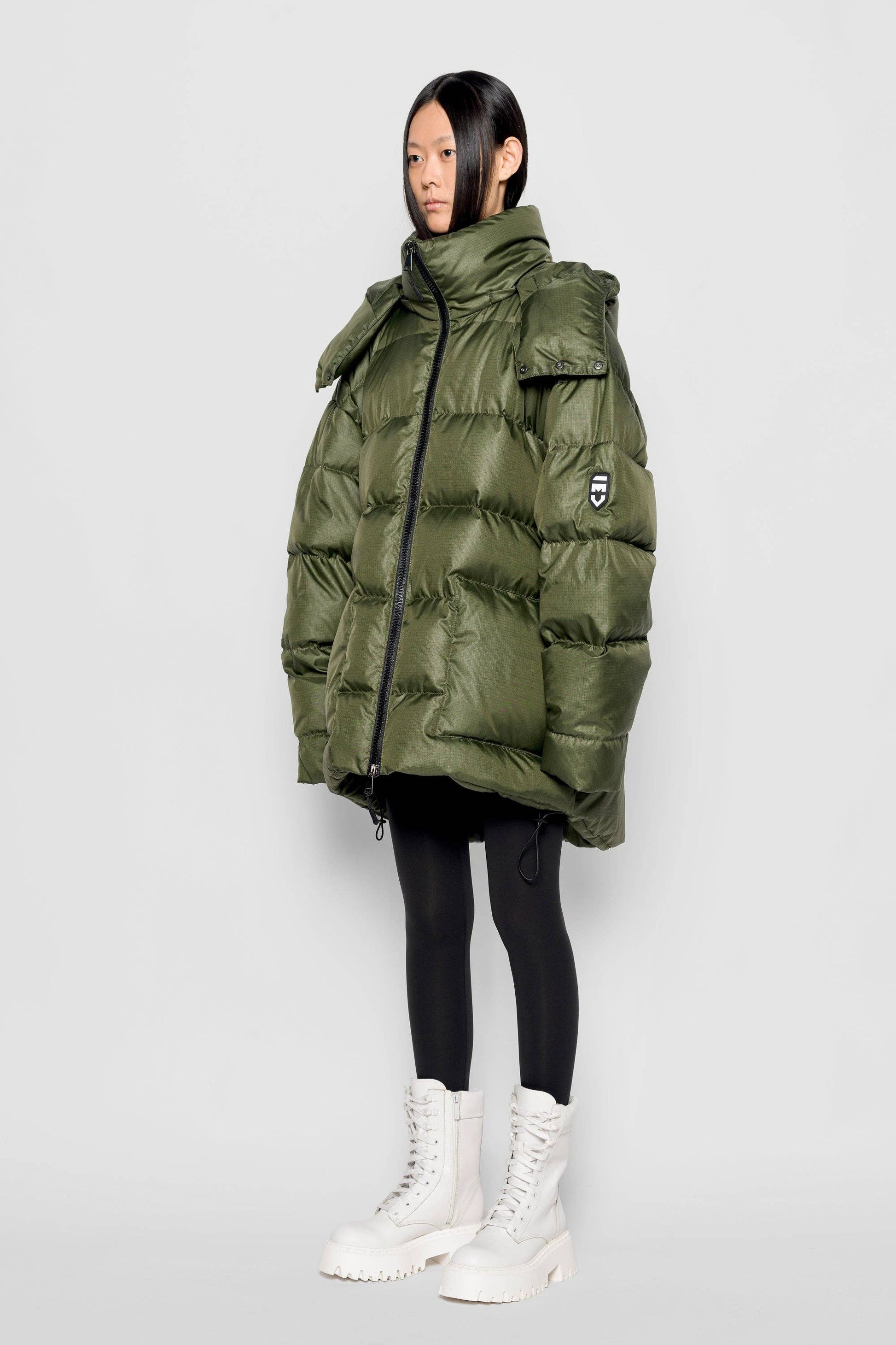 Piumino Iconica verde militare con cappuccio removibile