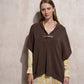 Cappa in maglia con fibbia decorativa