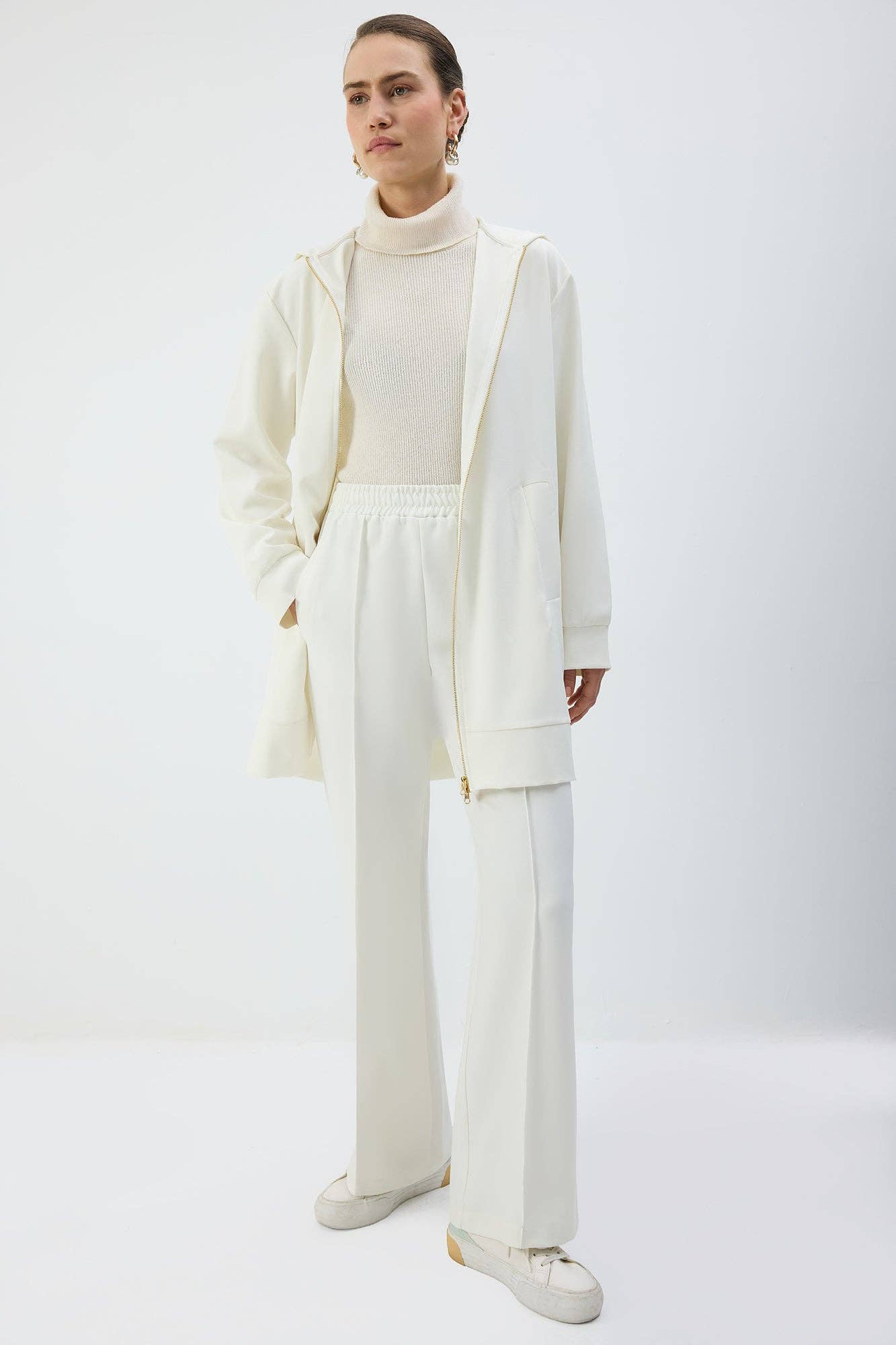 Giacca lunga con cappuccio e zip