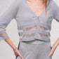 Giacca corta in maglia lurex con trasparenze