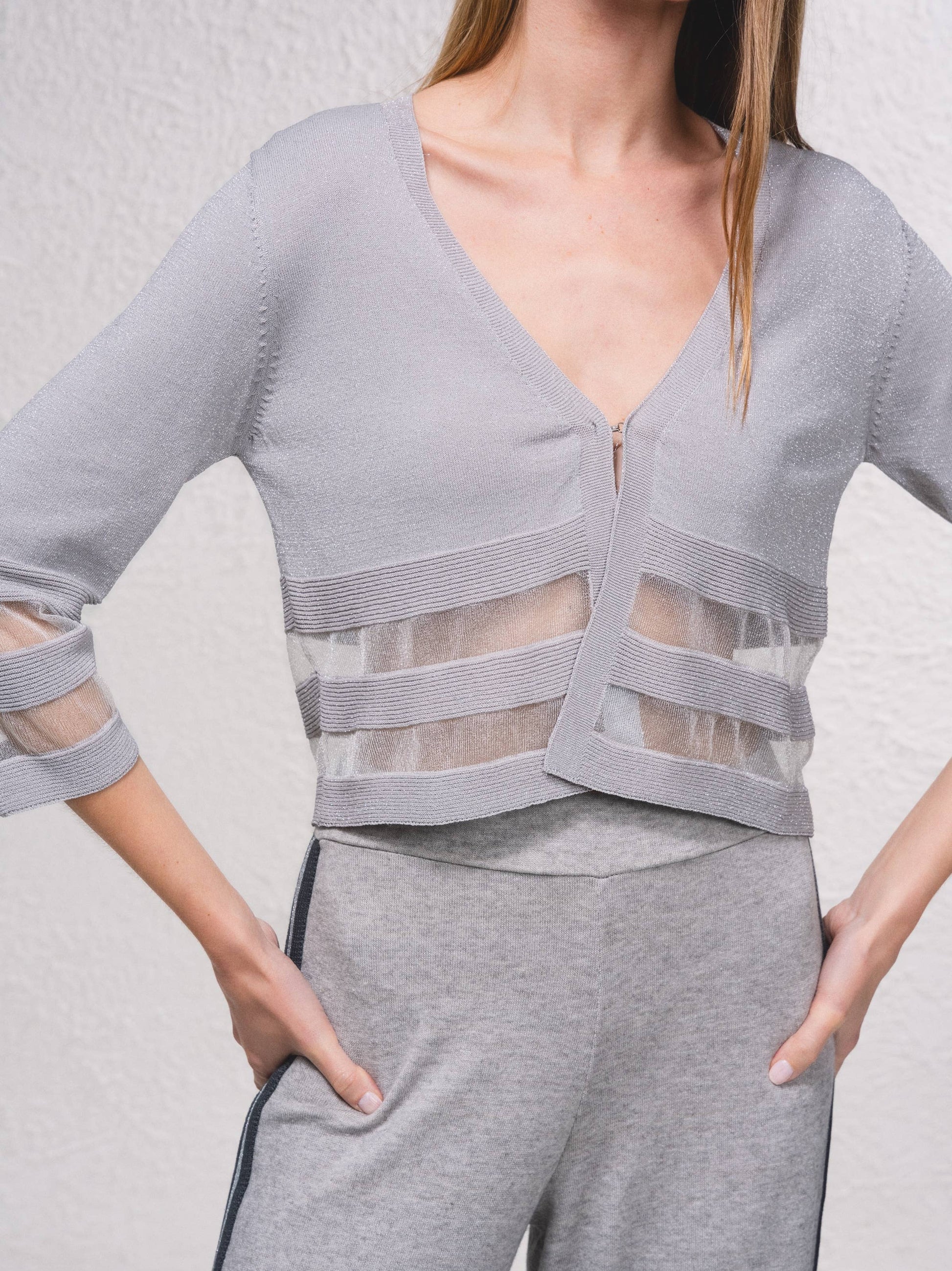 Giacca corta in maglia lurex con trasparenze