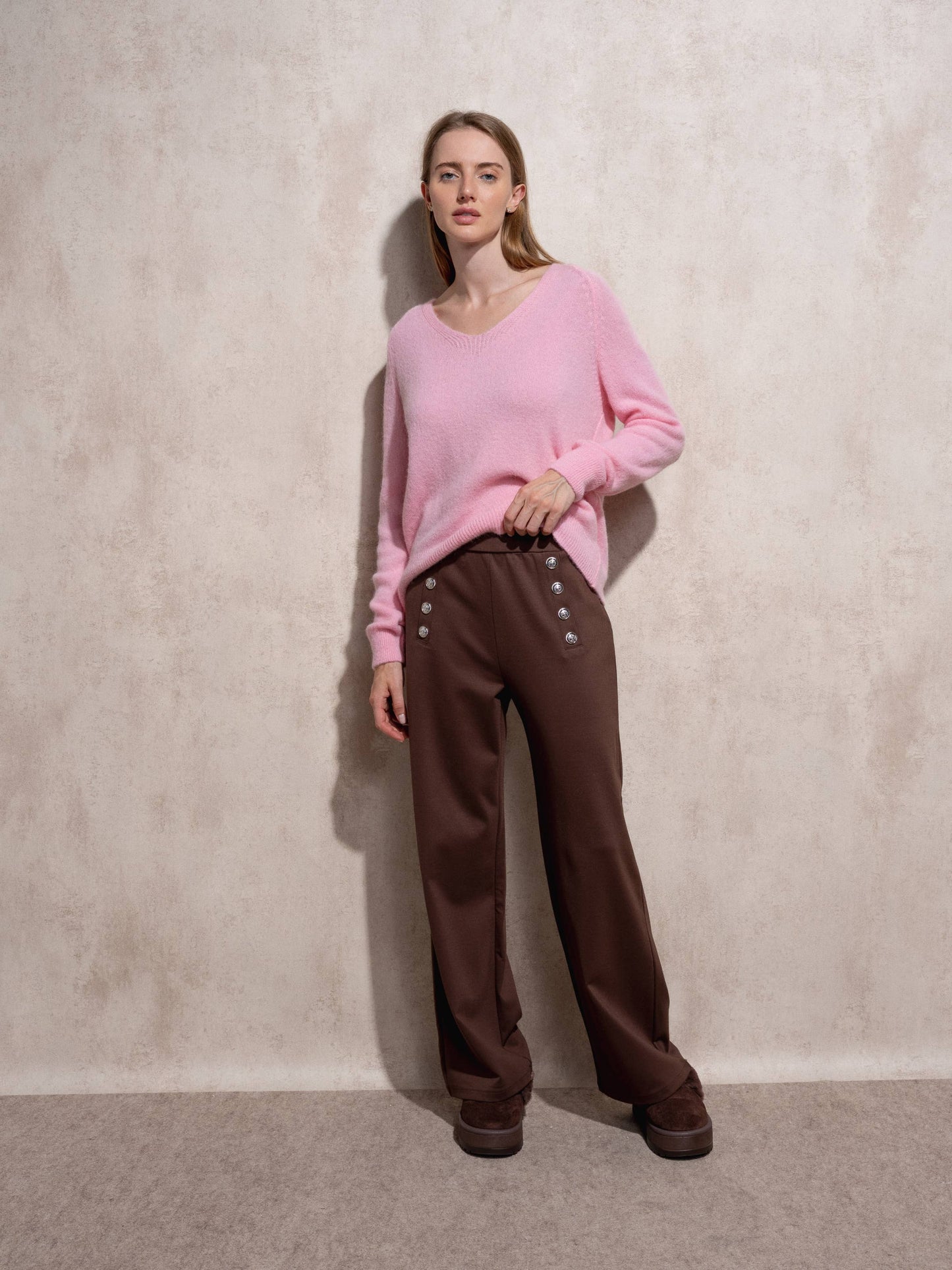 Pantaloni a palazzo a vita alta con bottoni decorativi