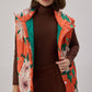 Gilet imbottito con cappuccio floreale arancione