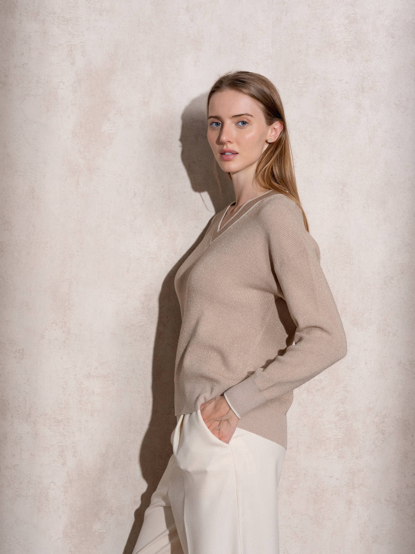 Maglione in maglia di lurex con scollo a V